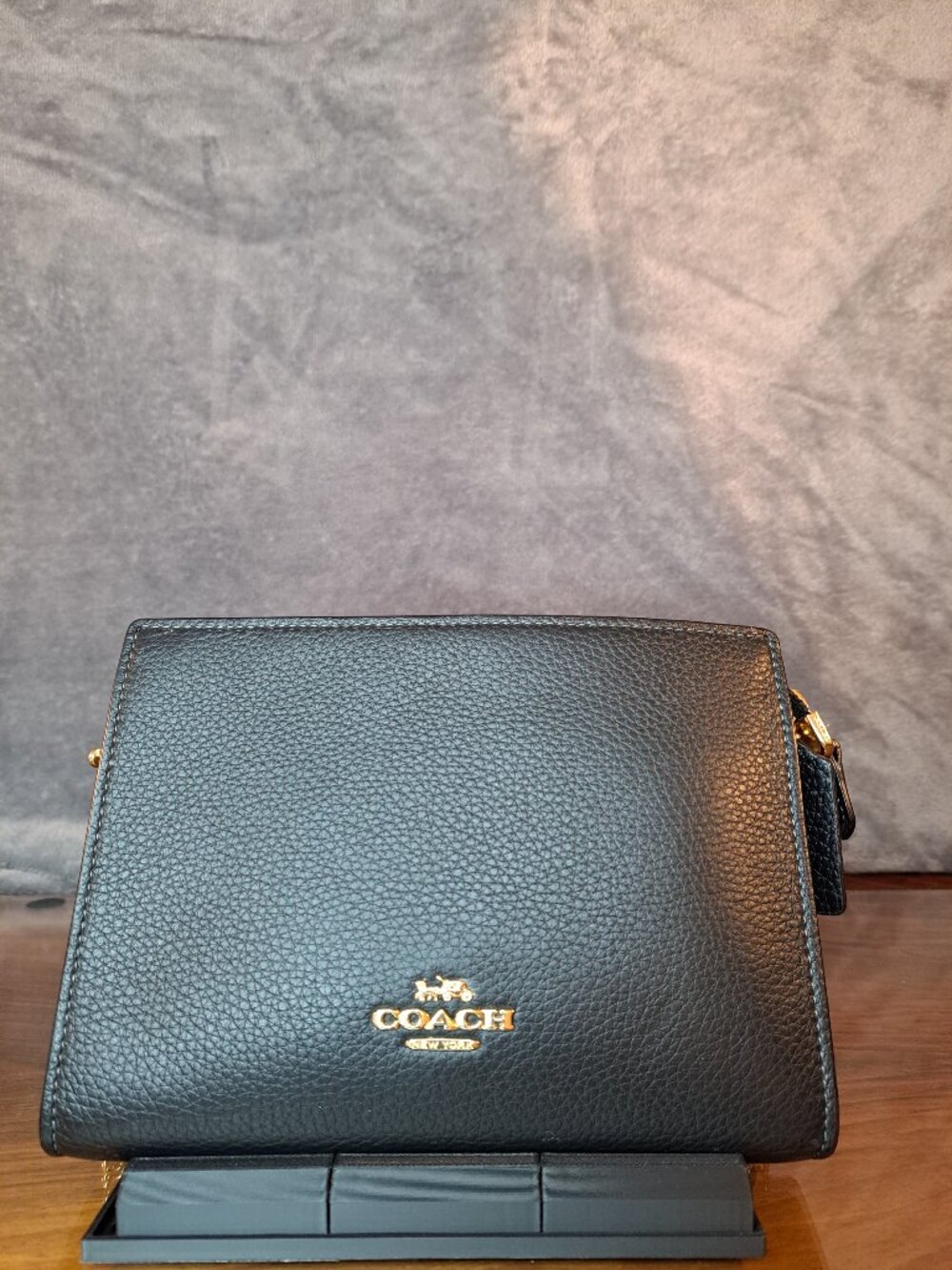 Coach black pebbled leather crossbody bag with gold chain